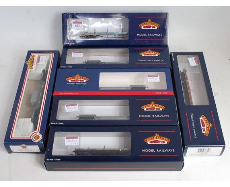 7 Bachmann bogie goods wagons, 3 bolster and 4 Weltrol including 33-878 LMS grey with transformer load (GNM-BGNM)