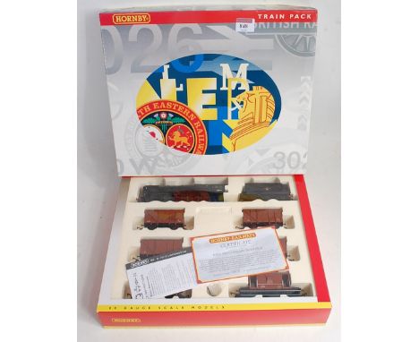 A Hornby R2139 'Fitted Freight' train pack containing class 9F engine and tender No. 920199, 5 goods vans and brake van with 