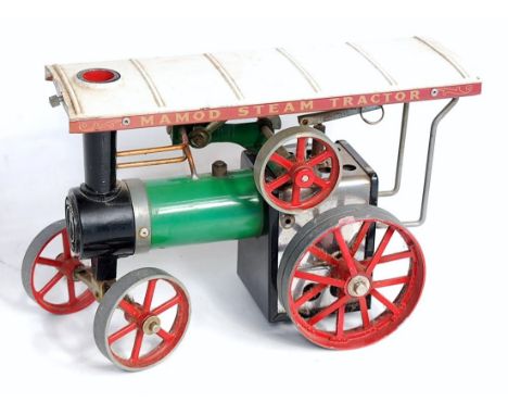 A Mamod live steam tractor traction engine, missing burner and steering rod, otherwise completely as issued, used example