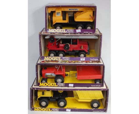 Meccano Mogul toys:- fire engine, articulated tipper, tractor and trailer and mobile crane, all boxed and unused (BG)