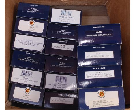 Box of 22 Bachmann wagons including 33526, 33527, 33528, each 3-wagon classic sets, 33876 BR Wellwagon and 12 other wagons (N