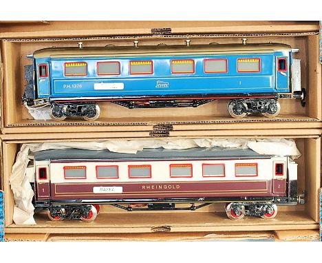 Two Paya bogie coaches - blue PH1376 'Zaragoza' and brown/white 1st/2nd class Rheingold 'Basol' silver on wheels starting to 