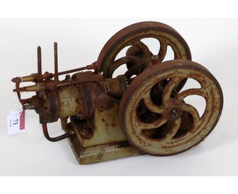 An early 20th century water cooled hot wire gas engine with radial cam operated hit and miss control, single cylinder with pi