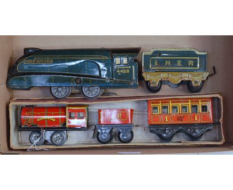 Two British made locos and tenders, Mettoy electric A4 style Union of South Africa 4488 with 4-wheel tender, base of loco and