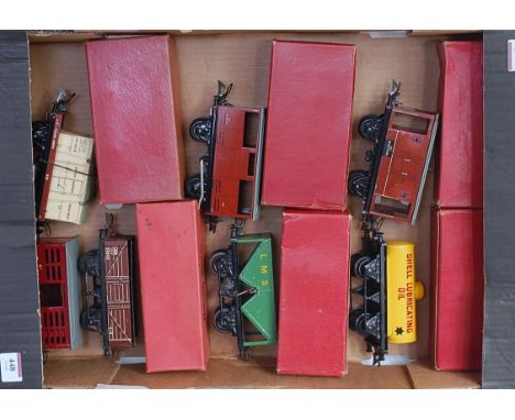 Tray containing 7 Hornby post-war wagons, some in wrong boxes, including No. 1 yellow Shell tender, LMS hopper, LMS wagon wit