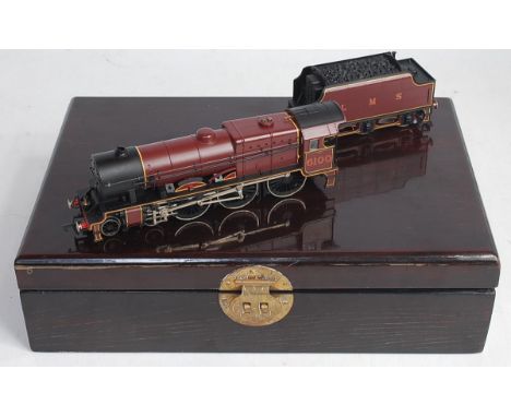 A Bachmann presentation box containing LMS maroon 'Royal Scot' engine and tender with brass nameplates, bell, crew etc, and c