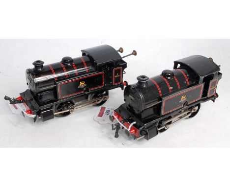 1954-60 Hornby type 40 tank engine x2, No. 82011 clockwork with lion over wheel, BR emblem, a few chips and scratches one wit