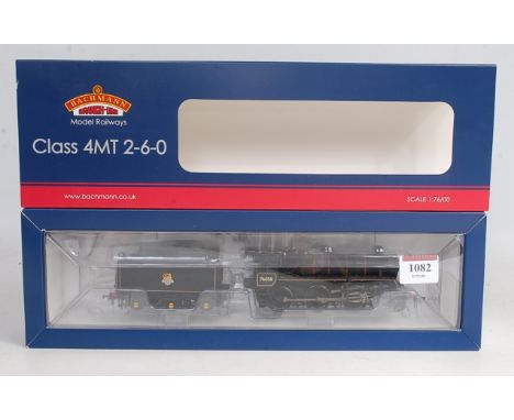 A Bachmann 32-954 BR lined black standard class 4MT 2-6-0 engine and tender No. 7605F early crest with instructions DCC ready
