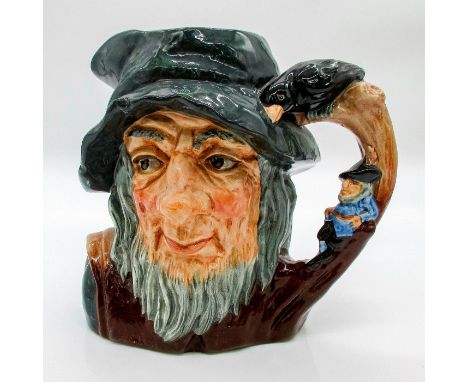 Glazed, hand painted ceramic. Variation One. The man is in a gray-blue cap, and brown robes. The handle is a man in blue rest