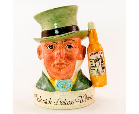 Inscription Pickwick Deluxe Whisky. Pickwick scotch whisky handle.Royal Doulton backstamp. Good condition. Artist: Harry Sale