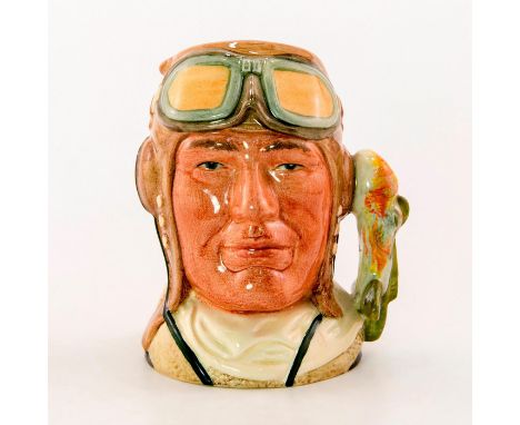 Style One, Variation One. Light brown cap; dark brown flight jacket with cream collar; white scarf without cypher.Royal Doult