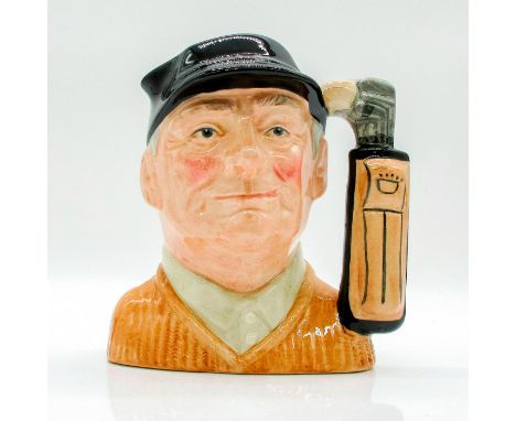 Variation One. Blue cap; brown sweater; tan shirt; light brown golf bag.This Golfer character jug was modeled in the likeness