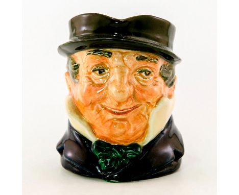 Blue-black coat, light blue collar; grey-green hat; white collar; red bow tie.Royal Doulton backstamp. Character from Charles