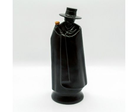 Black glazed ceramic; depicting the Sandeman mascot; originally filled with Sandeman Armada Cream.Wedgwood backstamp. Sticker