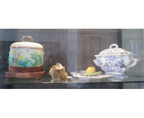 A majolica style stilton dish and cover, with floral relief decoration, 26 cm high, a Mason's Manchu pattern covered tureen a