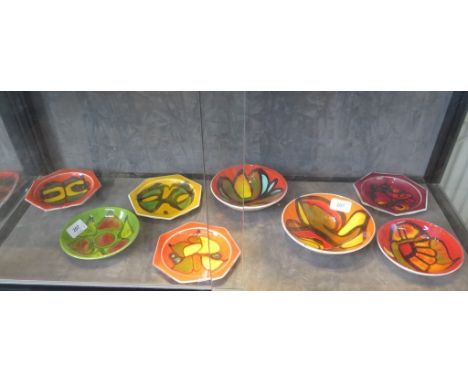 Four Poole Pottery Delphis heptagonal dishes, all with painter's marks, 15cm wide, two bowls from the same range, 15 cm diame