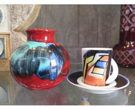 A Poole Pottery 'Gemstone' small bulbous shape vase, and a Rosenthal Studio Line Art Deco Cupola Nr 7 design cup and saucer s