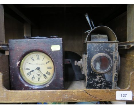 A 1942 black tin red traffic lantern, a tin helmet, and a timepiece the dial inscribed Saml.Woodyoust (3) 