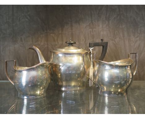 A three piece silver tea set, of baluster form, JS&amp;S maker's mark, Birmingham 1914, teapot 13.5 cm high, 576 g total weig