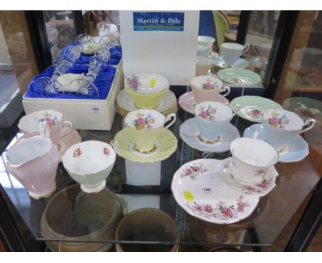 A Royal Standard part tea service, with floral sprays and coloured grounds, comprising five cups, six saucers, six plates, su