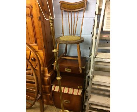 A brass telescopic lamp, chair and a telephone seat