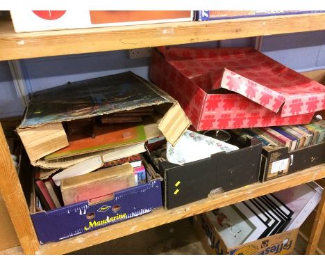 Shelf of assorted, books etc.