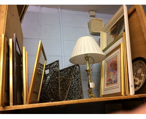 Quantity of prints, a lamp and a magazine rack