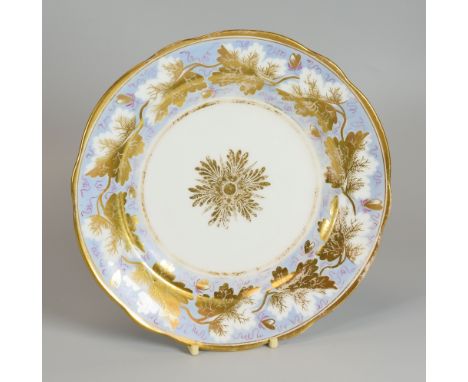 A NANTGARW PORCELAIN DESSERT PLATE, circa 1814-1823, of slightly lobed form, London decorated with gilded leaves and gilded r