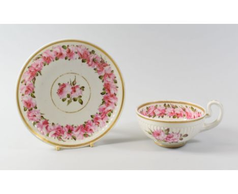 A SWANSEA PORCELAIN BREAKFAST CUP & SAUCER with Paris Flute moulding and painted with a continuous chain of pink roses within