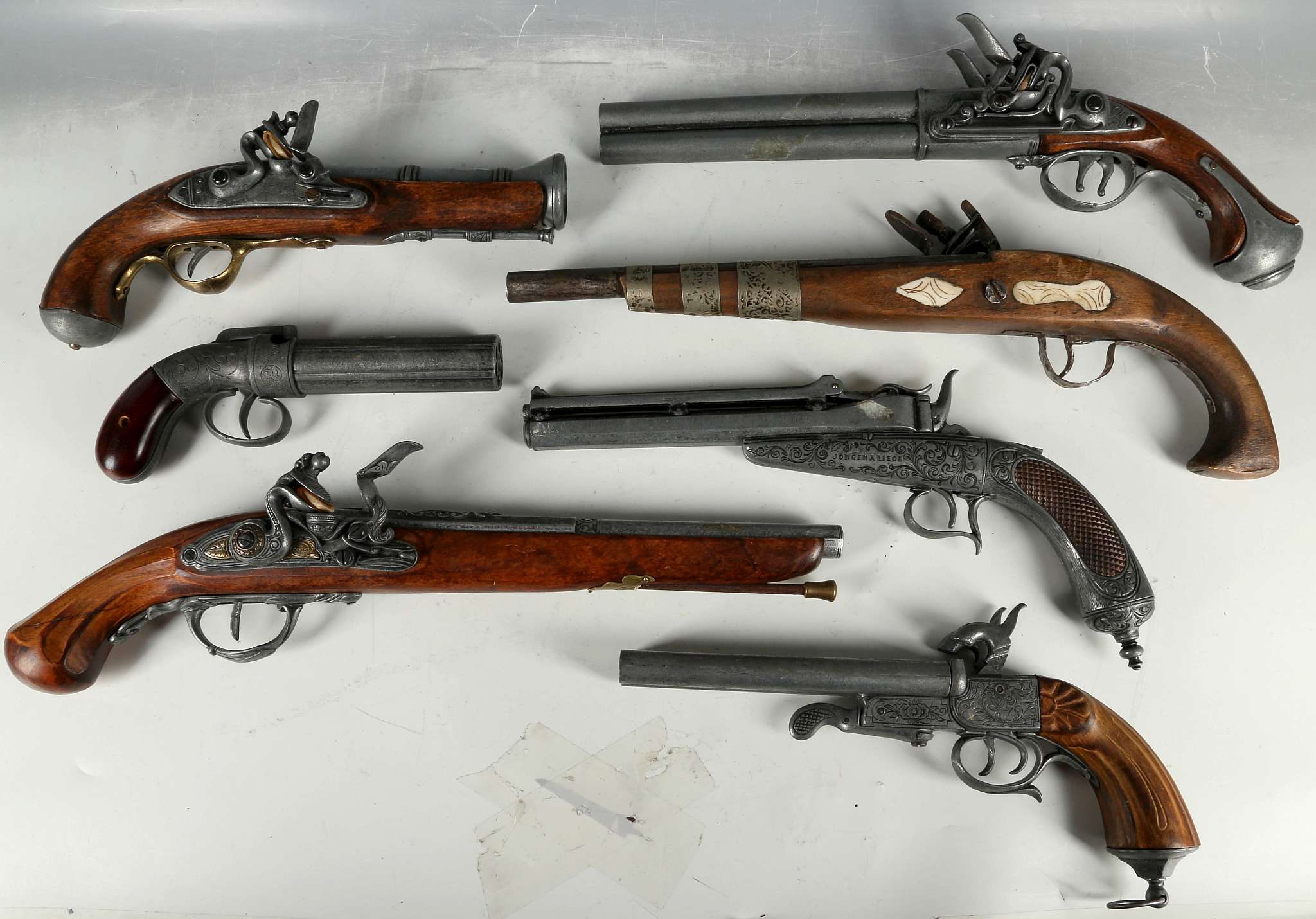 Collection of replica pistols; twin barrel flintlock, twin barrel