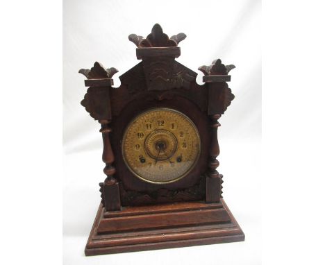 Ansonia Clock Co. New York USA, late C19th/early C20th oak cased mantel clock, carved case on shaped platform base, two train