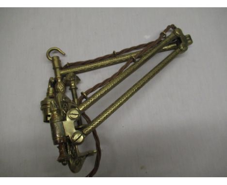 E &amp; F. Crook's Patent Action brass adjustable lamp with G clamp mounting bracket with cast decoration 