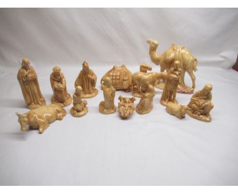 Ceramic nativity set dated 1979, comprising baby Jesus, Mary, Joseph, three wise men, two shepherds, two camels, donkey, cow,