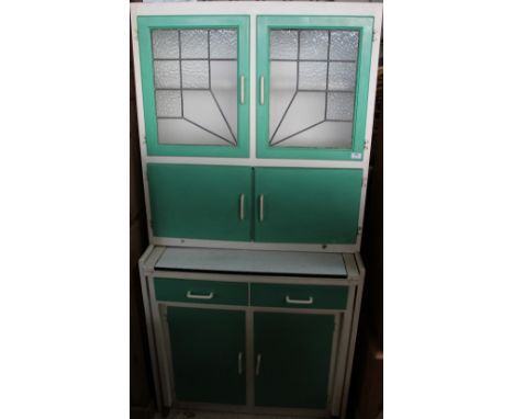 1960's/70's retro style kitchen cabinet, two upper glazed doors above two further cupboard doors, slide out enamel tray W91cm