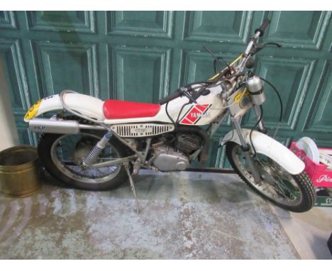 Yamaha 175cc two-stroke trials bike, registration Q110 WET, circa 1989, with bulb horn, water bottle and Sheffield North End 