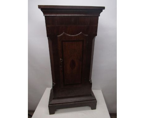 C19th mahogany crossbanded oak longcase clock trunk, adapted as a cupboard' on bracket feet, H101cm W52cm 