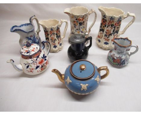 C20th Burleigh Ware Japonica teapot, Masons Patent Ironstone jug with snake handle, three graduated Staffordshire jugs, and o