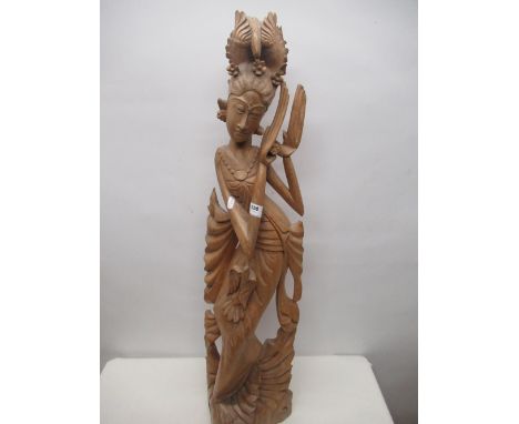 Tall South East Asian/Indonesian carved wooden sculpture of a dancer, 90cm 