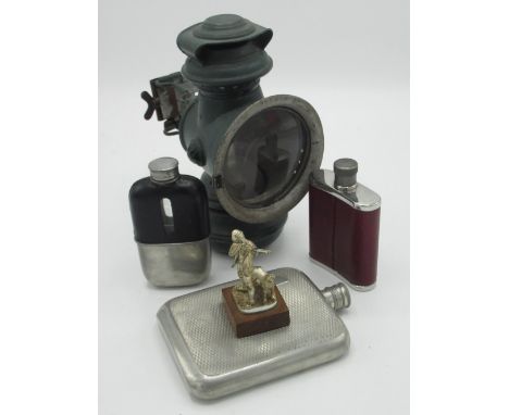 Small silver statuette "The Shot"  no. 167/1000 hallmarked Birmingham 1977, three hip flasks, bicycle lamp (repainted) 