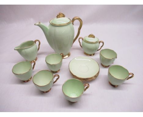 1930's Carlton Ware fifteen piece coffee service with gilded handle and borders, impressed marks to the base (one cup A/F) 