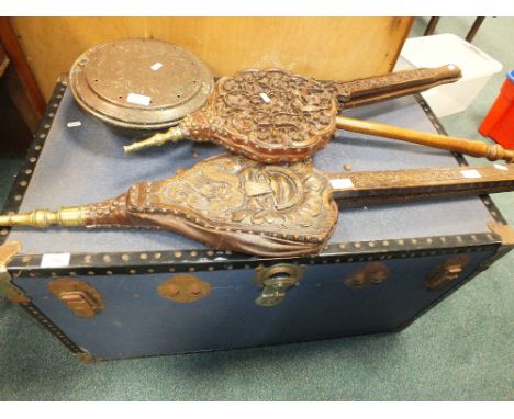 A blue metal bound cabin trunk, a set of Chinese hardwood bellows and Victorian oak mask carved bellows inscribed '1837-1897 