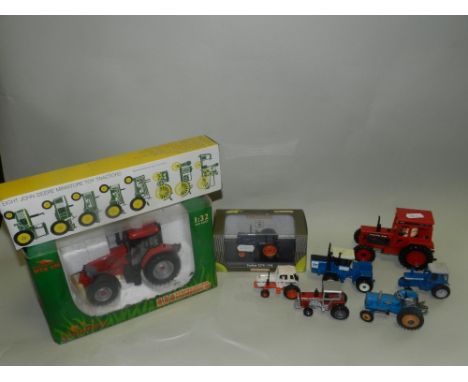 A group of boxed and unboxed die-cast model tractors by Universal Hobbies, Schuco and Erll to include a gift set of eight Joh
