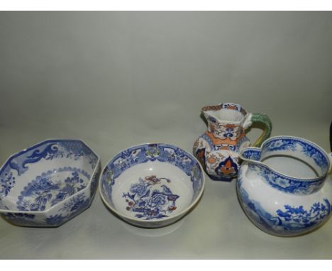 Japanese Imari lobbed plates, English 19th and 20th century blue and white plates, two glass decanters and stoppers, a Masons