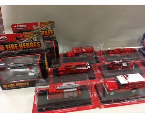 A Travelon soft skin suitcase containing a collection of Del Prado collectable fire engines, in window boxes also some Corgi 