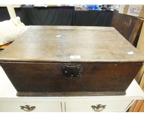 An early 18th century oak bible or document box with iron work lock plate and inscribed to the front, A K, on moulded plinth,