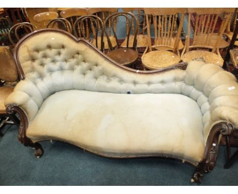 A Victorian mahogany framed spooned button back chaise longs (for restoration) 