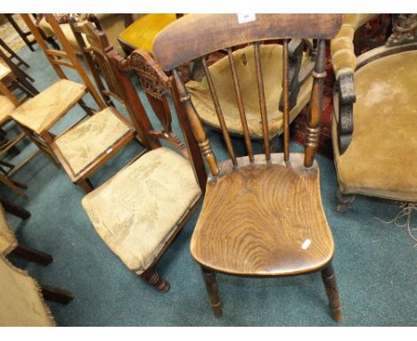 A pair of oak rush seat bar back bedroom chairs with pierced heart shaped top rails in the manner of Voysey, an Edwardian bed