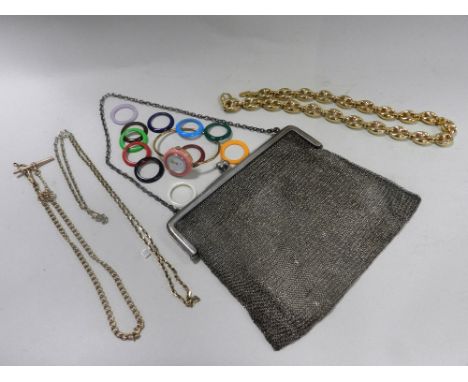 A Gucci bangle wristwatch with interchangeable coloured bezel together with a white metal mesh purse and three plated chains