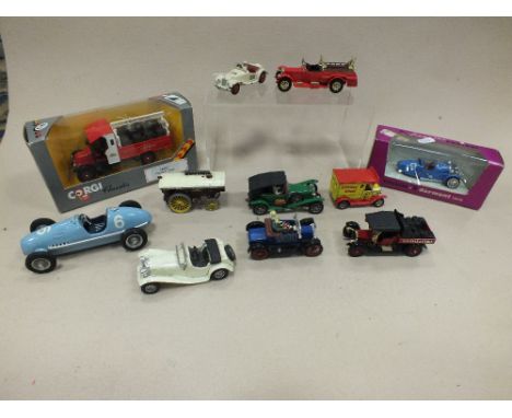 A box of boxed and unboxed die cast vehicles and plastic vehicles including Corgi Toys 448 BMC Mini Police Van, Matchbox mode