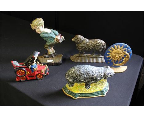 Collection of five cast iron door stops, fire engine, sheep, badger, etc, (5)